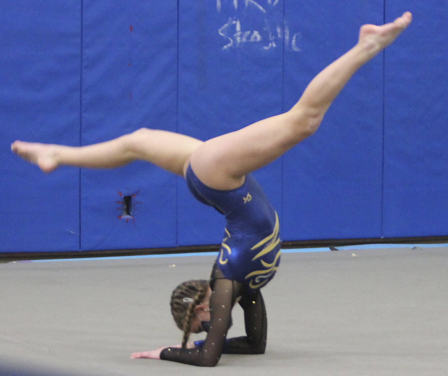 Spartan Phare Dietrich competes in the floor exercise.