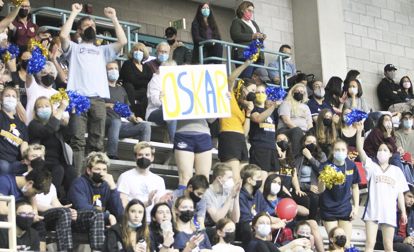 A good-sized crowd from Bainbridge Island cheers on the Spartan swimmers.