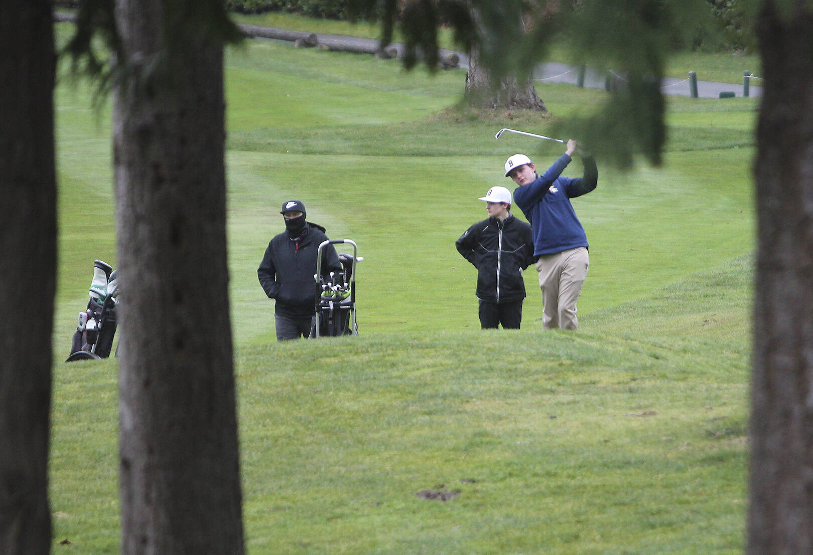Andrew Grinter of Bainbridge hits his second shot off Hole No. 1 at White Horse Golf Club against Kingston.