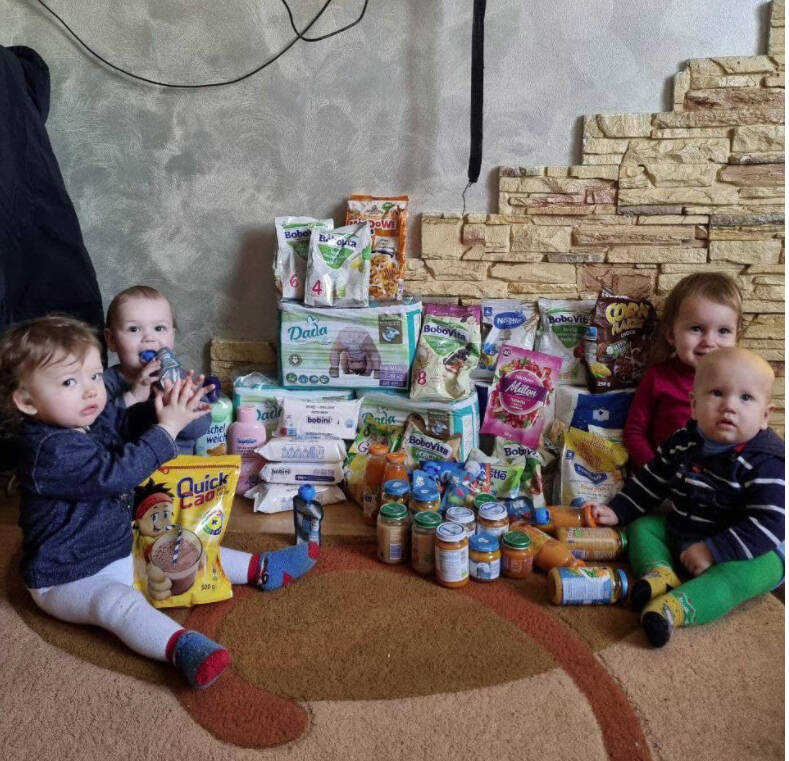 Courtesy Photo
Babies in Ukraine receive a supply of food and diapers from Perry’s team.