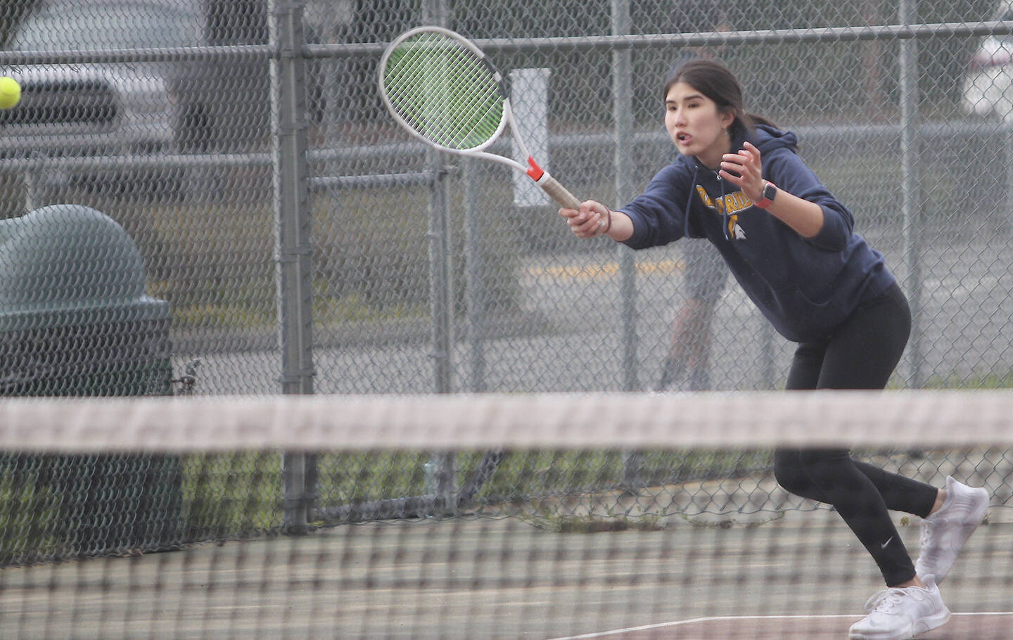 Aya Gatto smashes a forehand down the line against the Bucs.