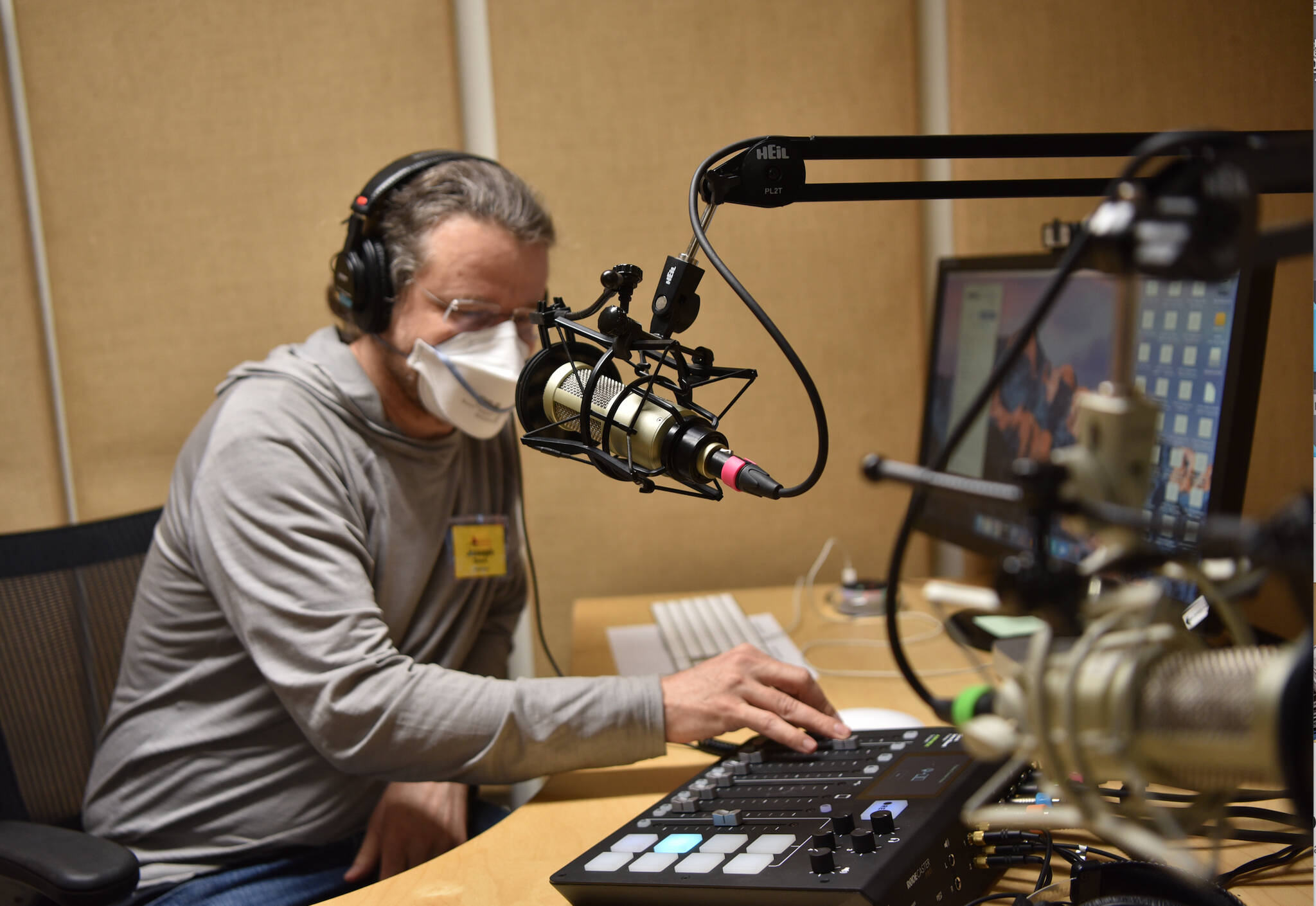 Volunteer Joseph Steck in the Media Arts studio where podcasts are produced.