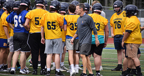 Jeff Rouser and the Spartans prepare to work out during the spring football season. Nick Zeller-Singh/Bainbridge Island Review photos