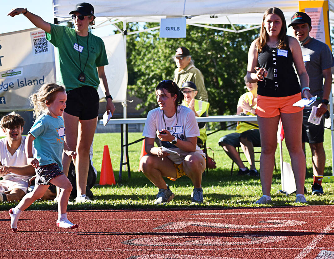 This young lady sprinted to the finish line in the 50 meters.