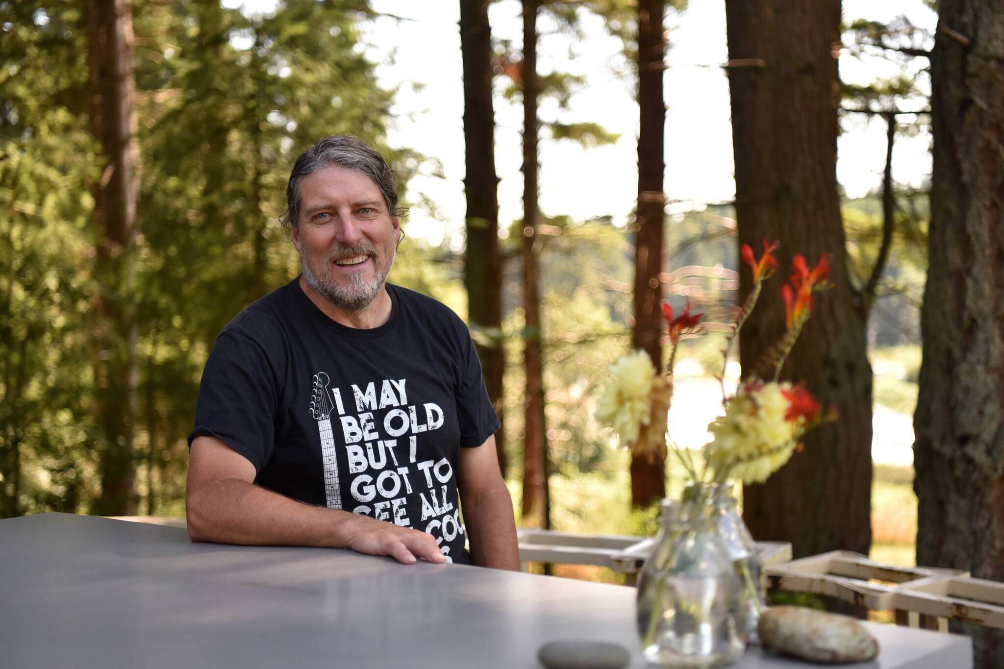 Perennial Vintners owner Mike Lempriere offers wine at his outdoor tasting room.