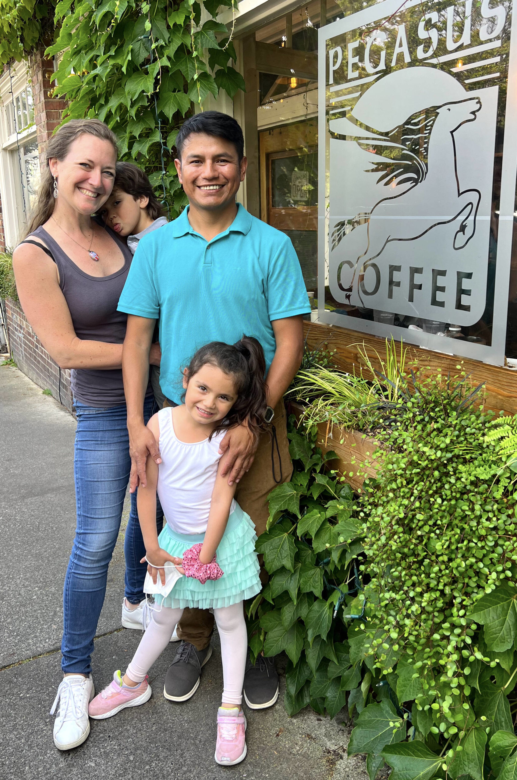 Gerson Morales, wife Alissa Moen, son Luka (3) and daughter Maia (5) at Pegasus Coffee during a trip to visit family on Bainbridge Island.