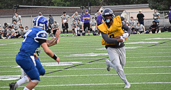 Bainbridge's Micah Bryant picked up several yards as running back and earned two pass breakups as defensive back. Nicholas Zeller-Singh/Bainbridge Island Review Photos