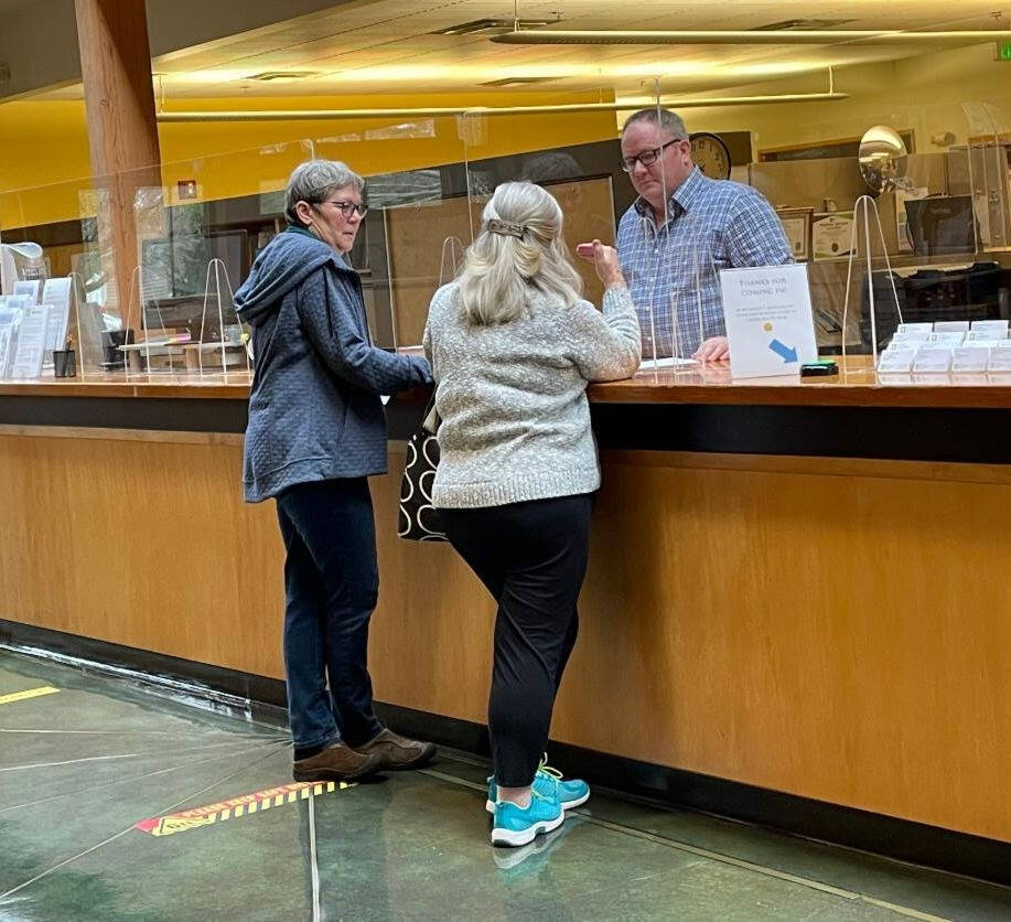 Citizens visit the permit counter at City Hall. Courtesy photo