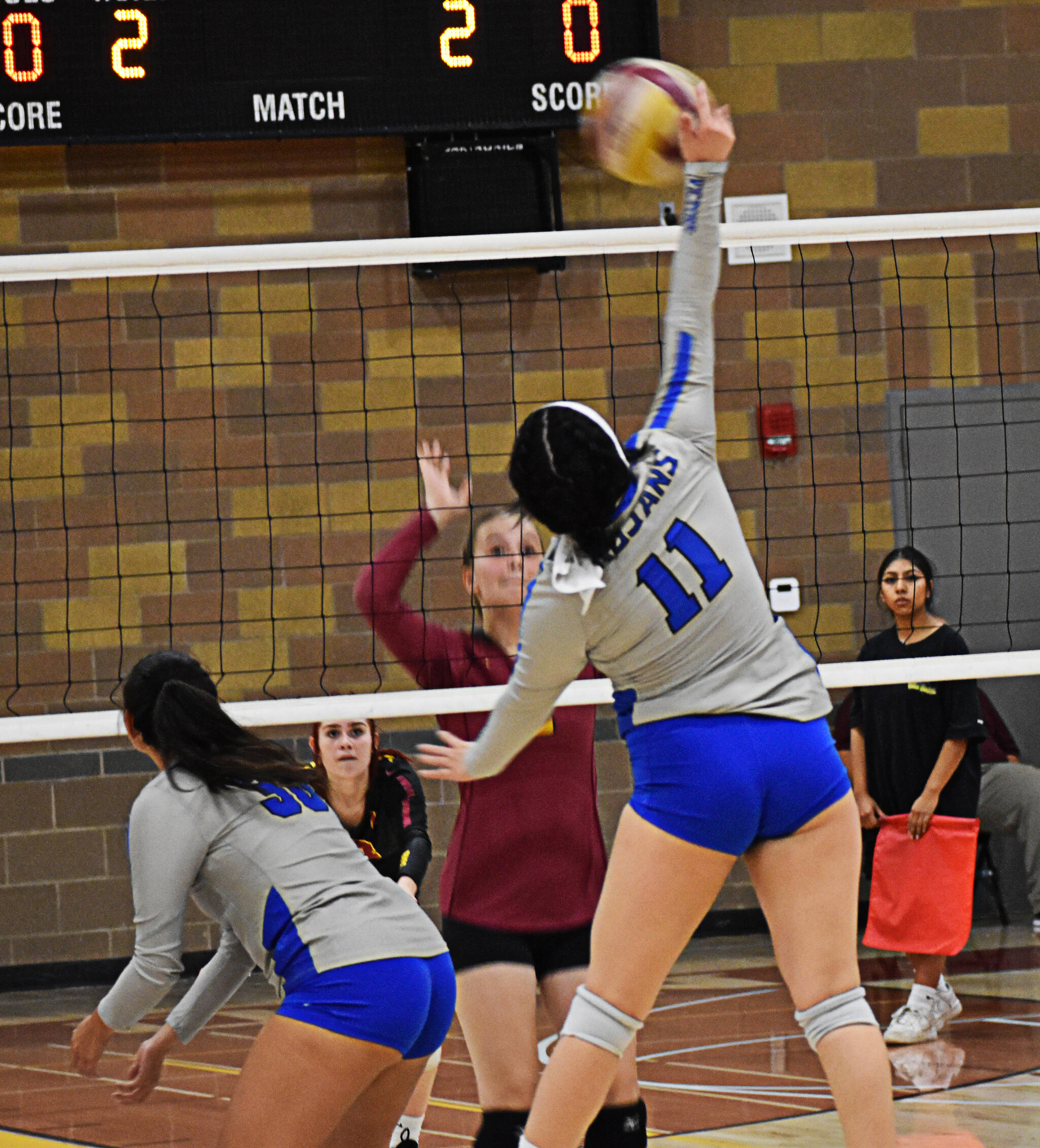 Olympic’s Cassidy Cortez attempted to keep the Trojans alive with her kills.