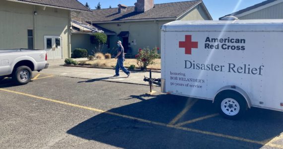 Red Cross vehicles and trailers sit outside the Silverdale United Methodist Church, which was activated as an emergency shelter for the fire victims. Elisha Meyer/Port Orchard Independent