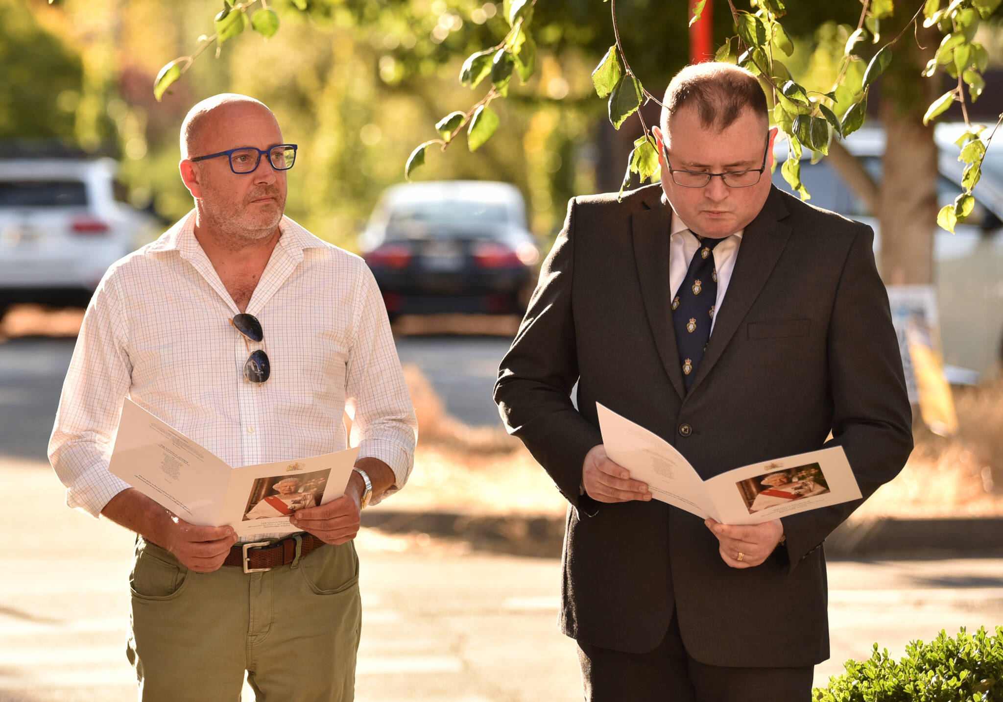 Richard Firth, founder of the BI Brits Facebook group, and Mark Kenny attend the memorial service at Lynwood Center.