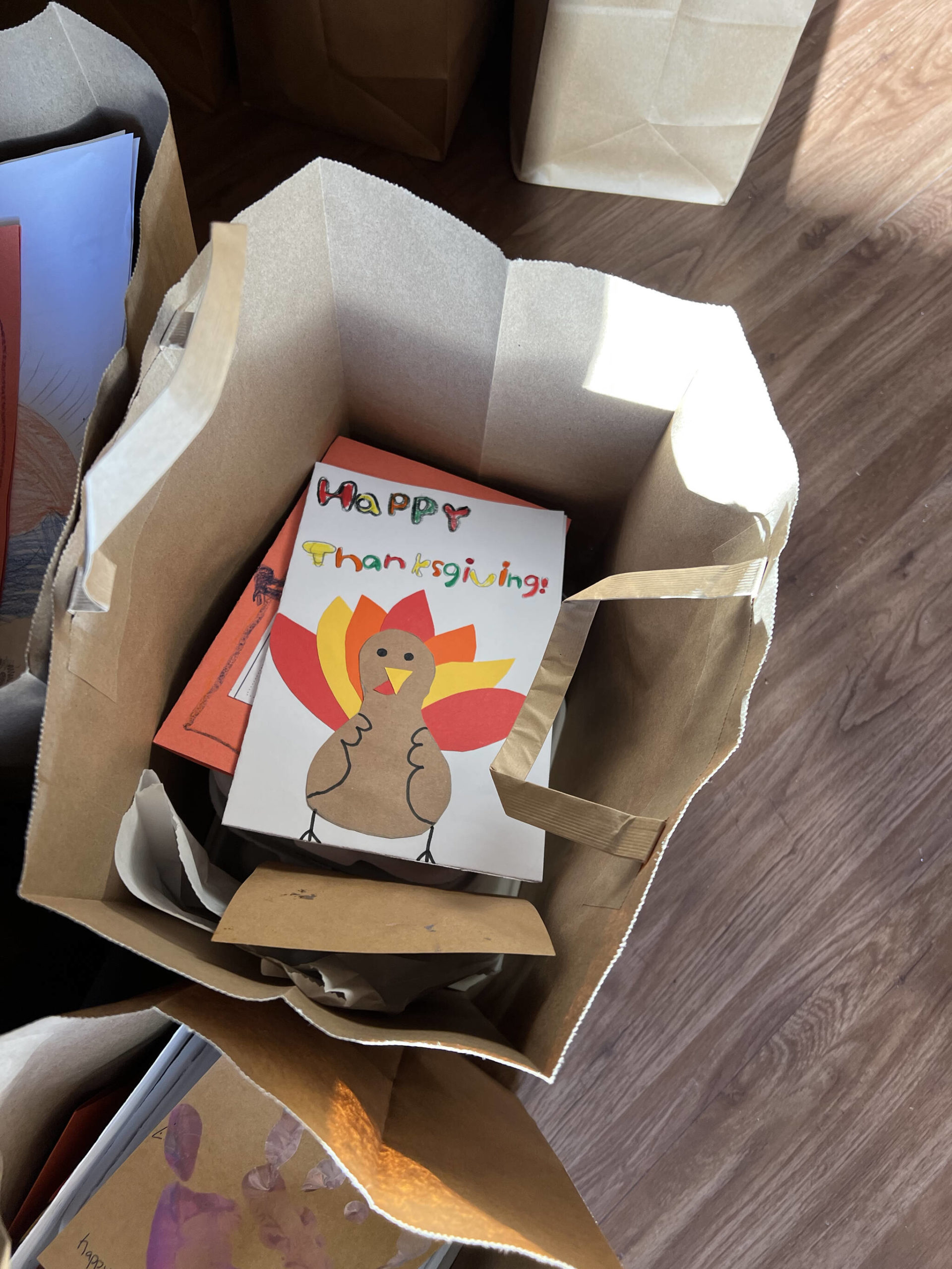 Cards and letters made by school children from Bainbridge Island are included with the turkey dinner deliveries.