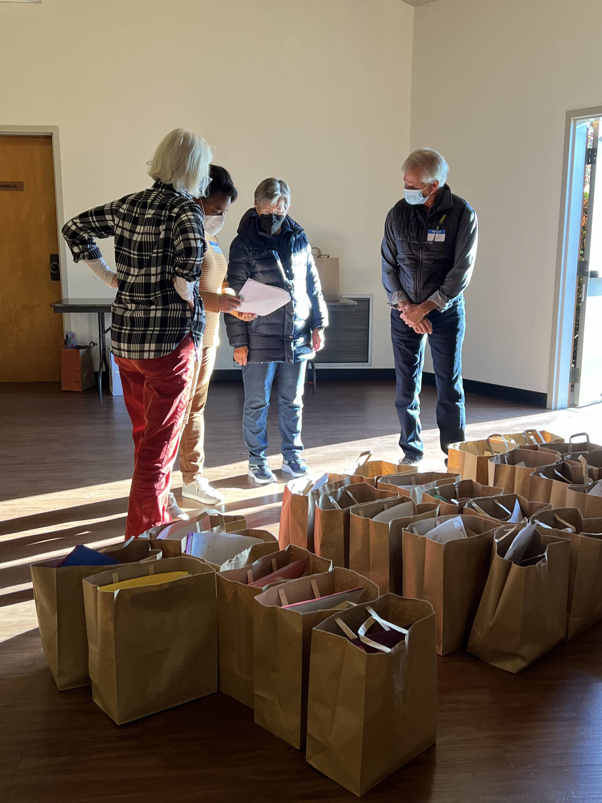 Volunteers at St. Cecilia Catholic Church collect and deliver meals for residents who were not able to cook a Thanksgiving meal or attend a gathering.