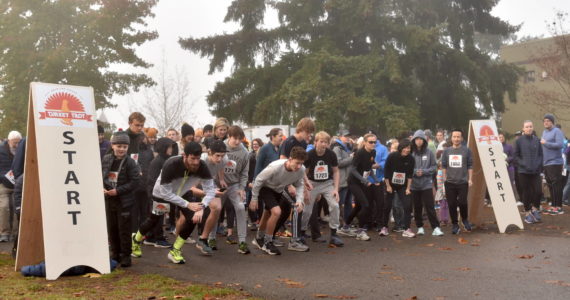 Nearly 900 people turned out for the annual Turkey Trot at Battle Point Park on Thanksgiving Day. Nancy Treder/Kitsap News Group Photos