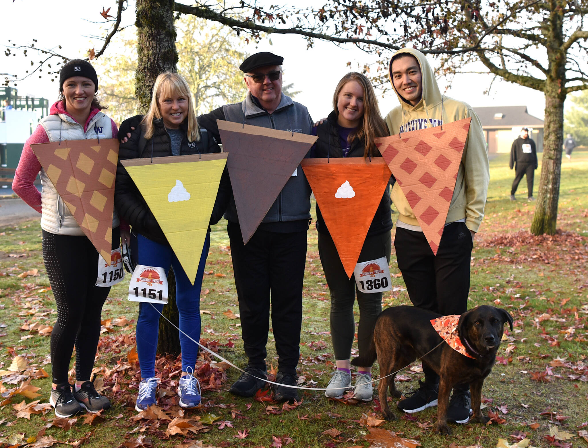 The Cox and Kusuda family ran the race dressed as slices of pie for Thanksgiving day which included; Kristin Cox as lattice, Leslie Cox as lemon, David Cox as pecan, Kaylee Kusuda as pumpkin and Kyle Kusuda as the cherry slice along with their dog Bear.