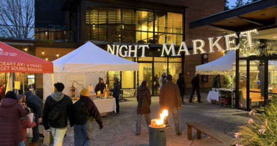 The Bainbridge Island Art Museum hosted the first Winter Night Market at Gateway Plaza Dec. 2 to celebrate the holiday season with food, music, art, shopping, creative activities for kids, short film and fire pits for socializing. Nancy Treder/Kitsap News Group Photos