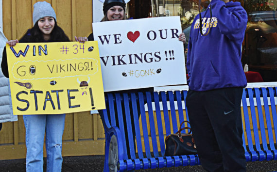 Carter Dungy’s family and friends cheered the team as they were escorted through downtown Poulsbo early Dec. 3. Nicholas Zeller-Singh/Kitsap News Group Photos.