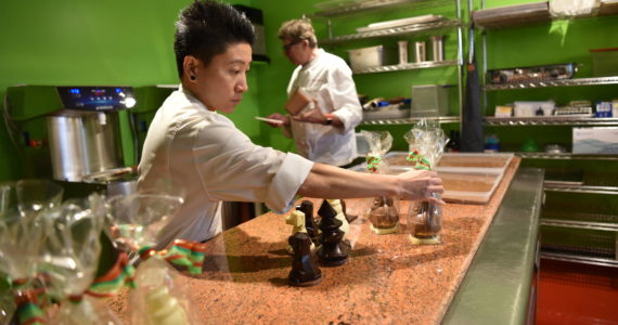 Pastry chef Tae Tran and Chef Tamas Ronyai make chocolates at their newly opened chocolate shop, L’Atelier TR, located on Winslow Way. Nancy Treder/Kitsap News Group Photos