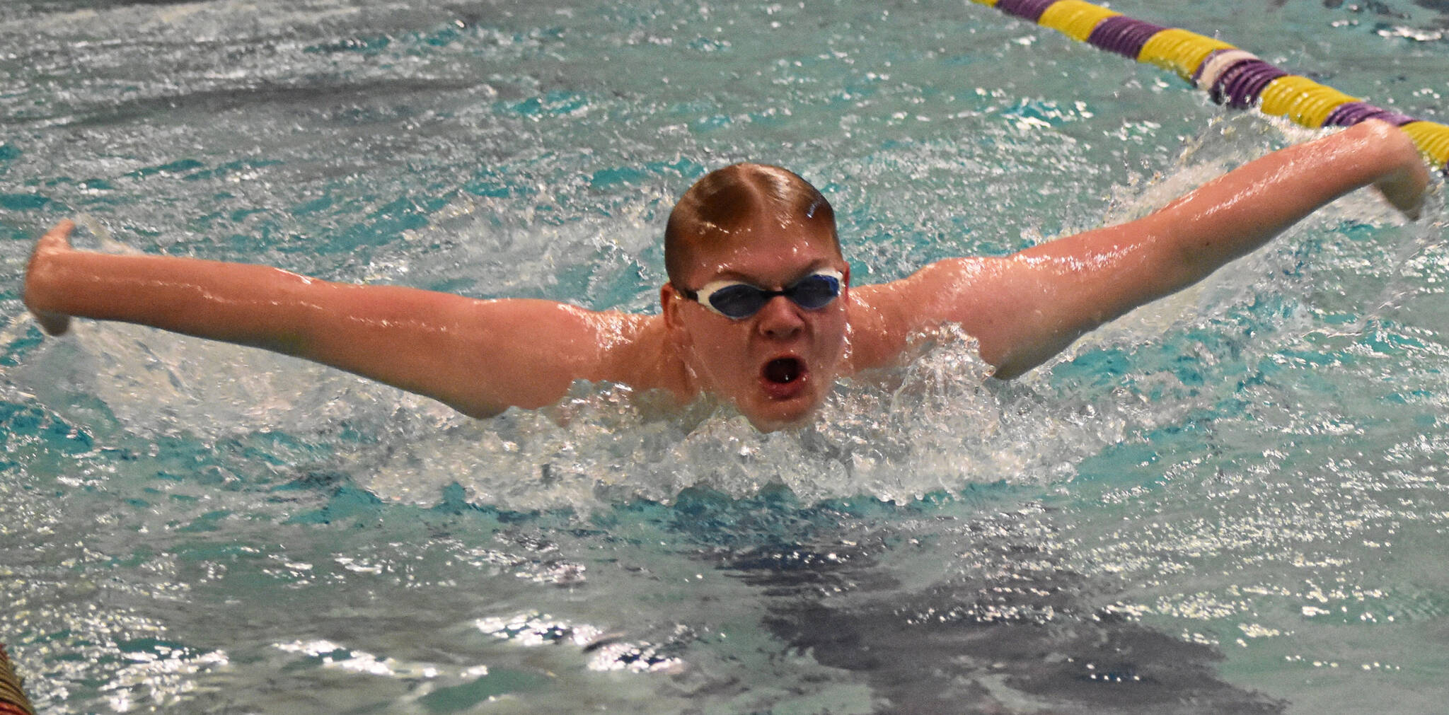 Andrew Gyllensten placed fifth in the 100-yard butterfly.
