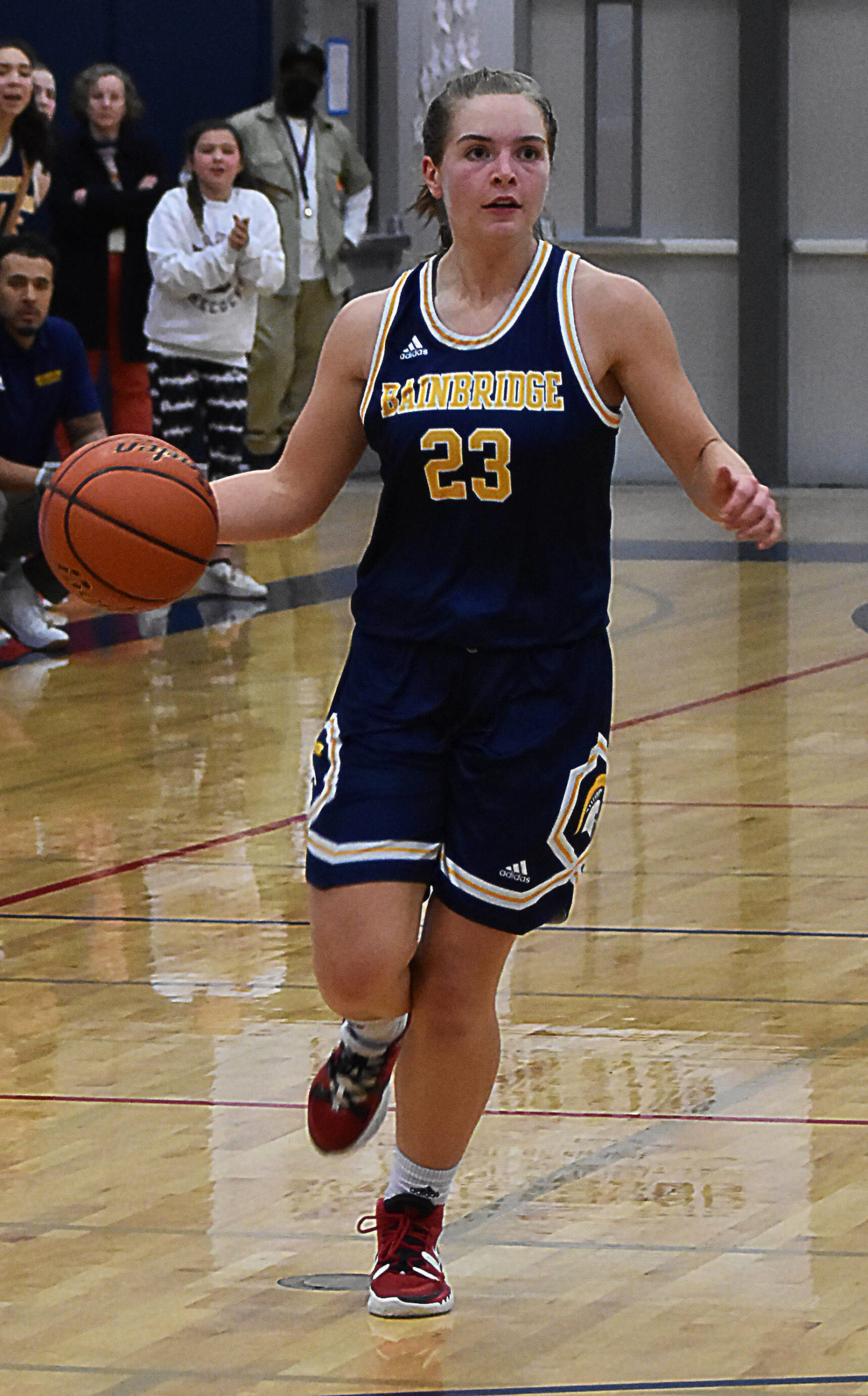 Sierra Berry pushes the ball up the court for Bainbridge.