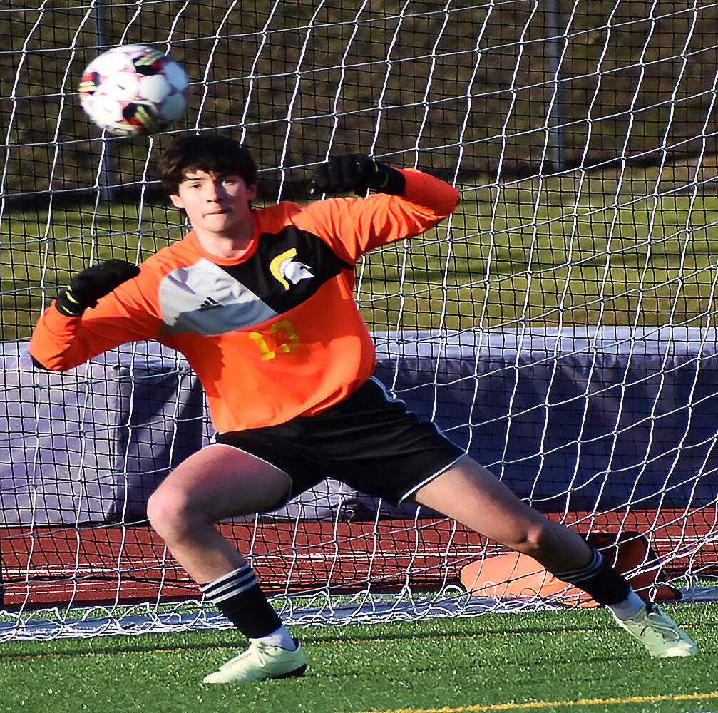 Spartan Finn Archibald lays out for a save.
