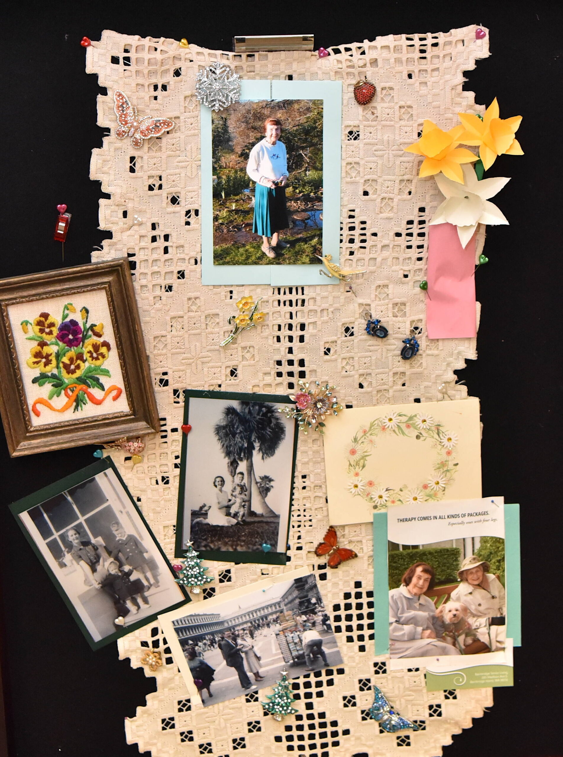 Jillian Copeland created a display case of Jean Wohlsen’s favorite mementos, including photos and a collection of her favorite brooches.