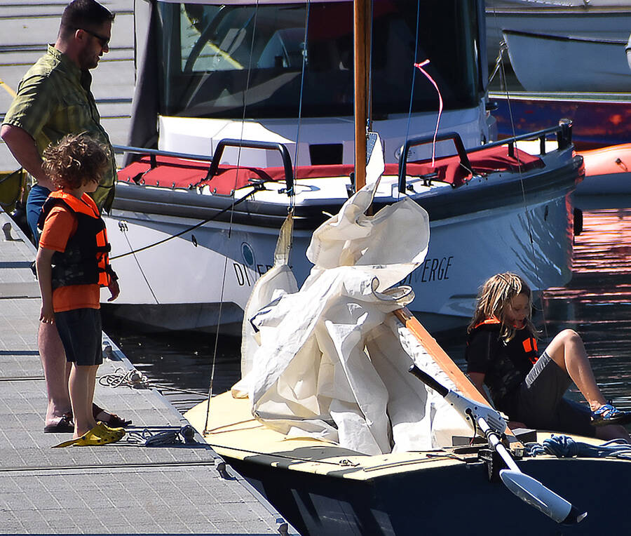 A family learns it takes quite a lot to get a sailboat ready.