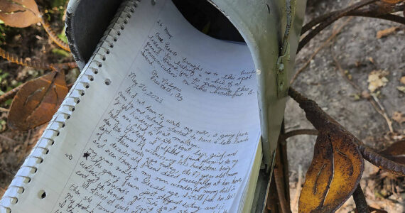 Bainbridge Island City Councilmember Clarence Moriwaki left this journal entry in the Kindred Spirit mailbox at Fort Ward Park. It is installed on a tree of life sculpture, and there's also a kids' version. Denise Stoughton courtesy photo