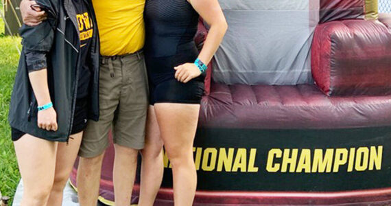 Carly Millerd courtesy photos 
Amalie Millerd (left) and Carly Millerd (right) enjoy their experience at NCAA rowing championships with their father Greg Millerd.