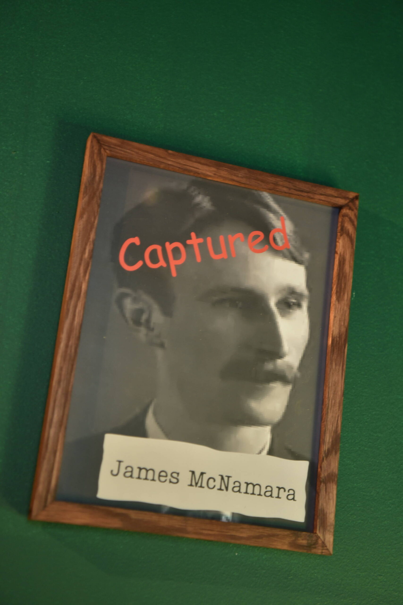 A portrait of James McNamara, one of the five men responsible for the bombing of the LA Times building in 1910 that killed 21 people and injured more than 100, hangs on the wall in the escape room.