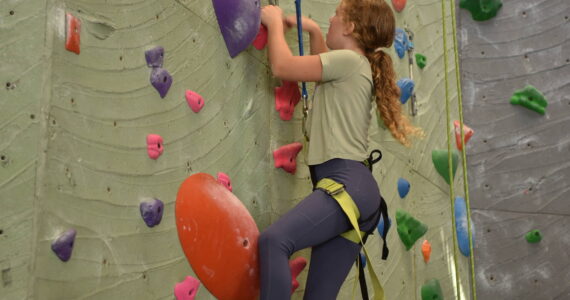 Nancy Treder/Kitsap News Group Photos
Summer camp students participating in the BI Parks & Recreation Climbing Camp at Insight Climbing & Movement Aug. 24 learned various rock climbing styles and concepts including bouldering and knot tying. Instructors guided climbers to improve their climbing and confidence through climbing games and activities with other peers.
