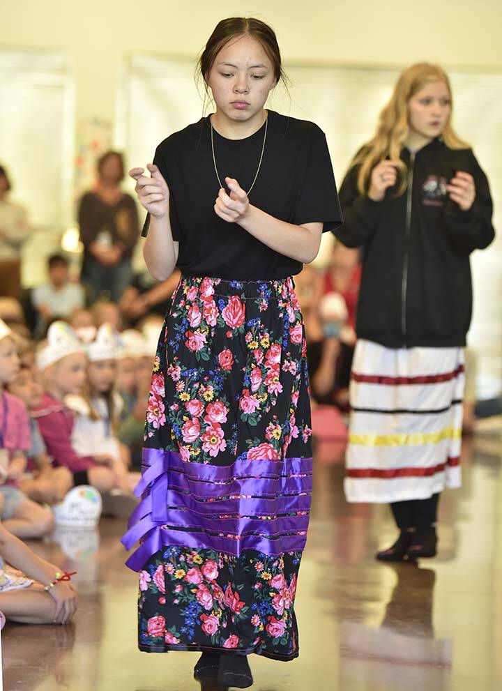 Talynn Marquez, a Chief Kitsap Academy sophomore, performs during the Warrior Dance.