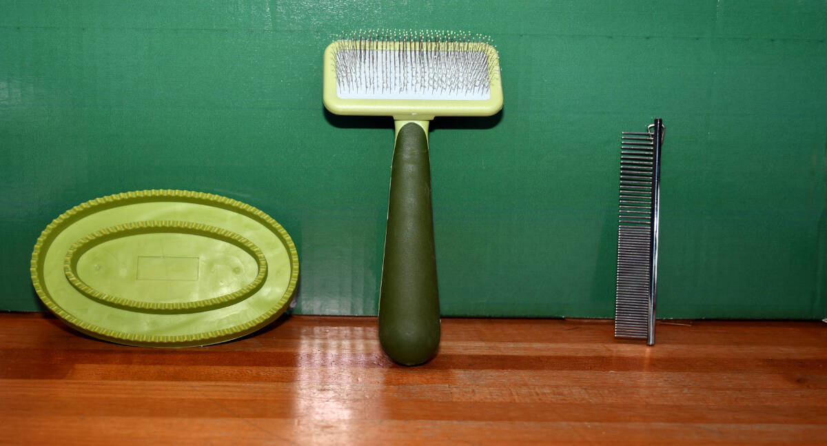 The right tools can make all the difference when it comes to shedding pets. From left: a rubber curry comb, a slicker brush and a stainless steel comb. Photo courtesy Paws and Fins Pet Shop