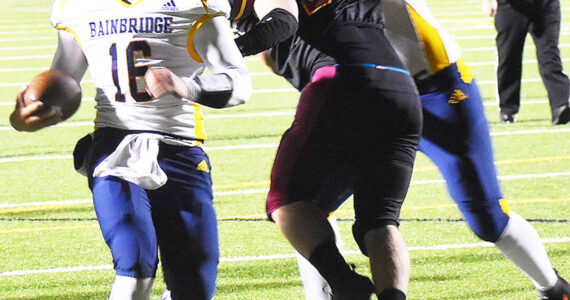 Nicholas Zeller-Singh/Kitsap News Group Photos
Spartan quarterback Jack Grant rushes in for a touchdown.