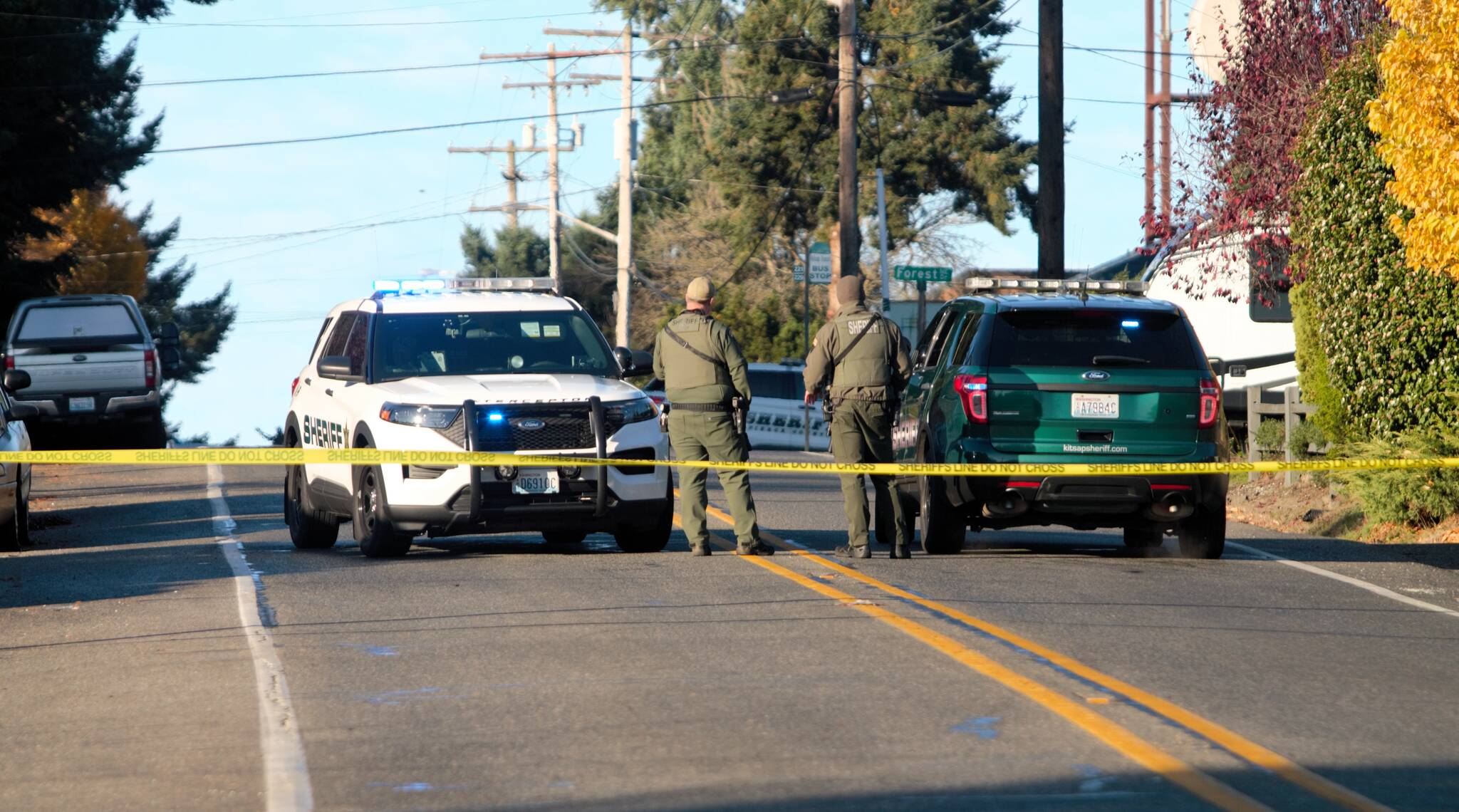 Elisha Meyer/Kitsap News Group
Armed police officers block off traffic on NW Sylvan Way in the midst of a police standoff.