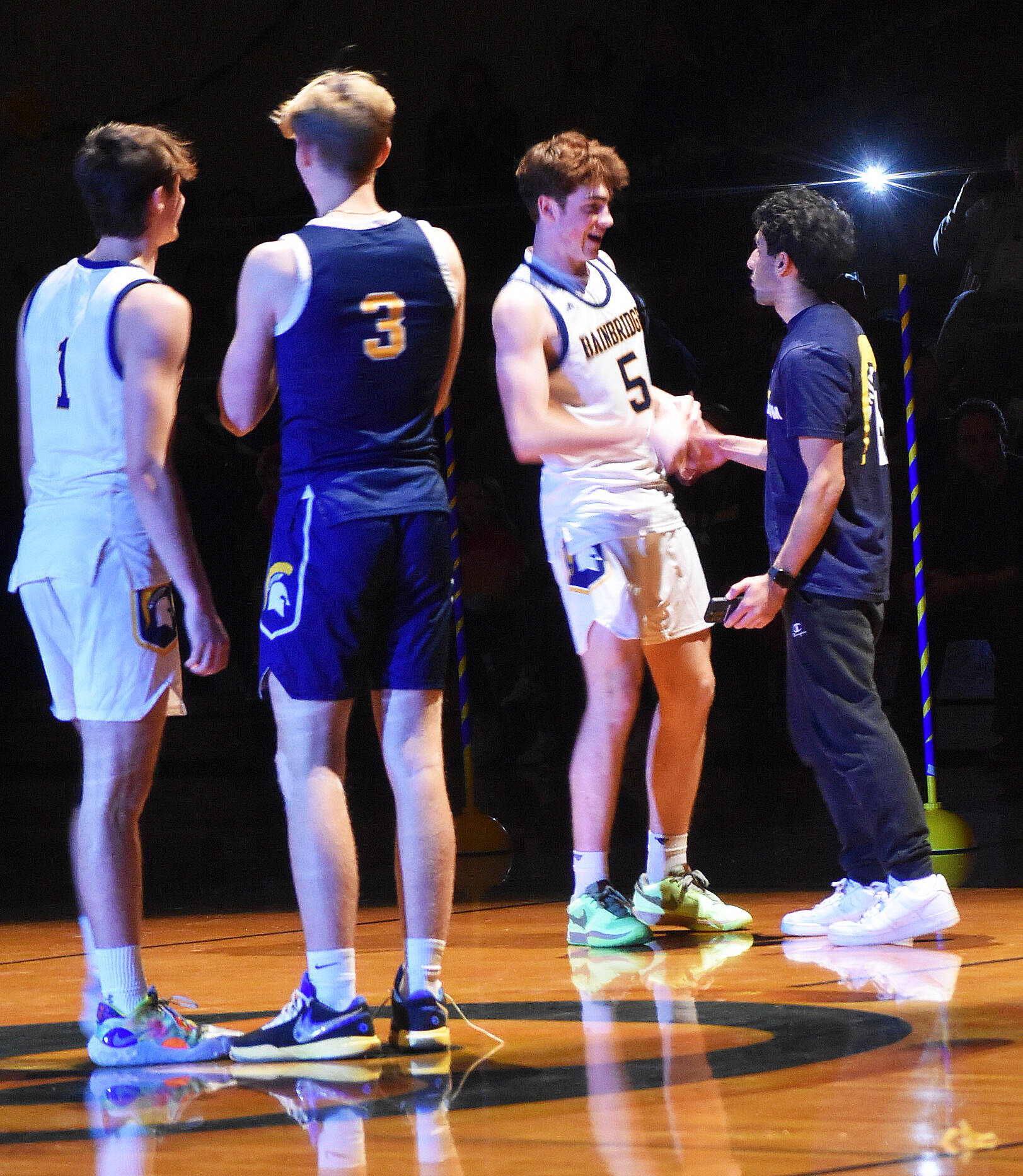 The Bainbridge boys basketball team is introduced to the Spartan community.