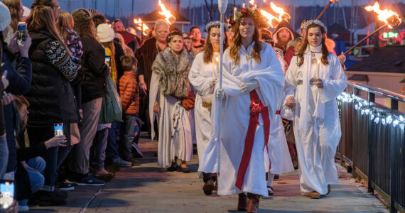 Damon Williams/Kitsap News Group Photos
The Lucia Bride’s procession during Julefest in downtown Poulsbo Dec. 2.