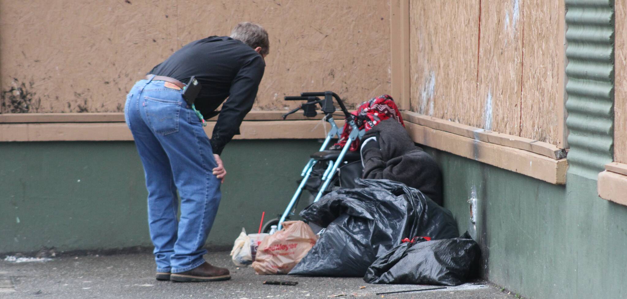 Elisha Meyer/Kitsap News Group
A conversation with a homeless person near the Salvation Army’s seasonal shelter.