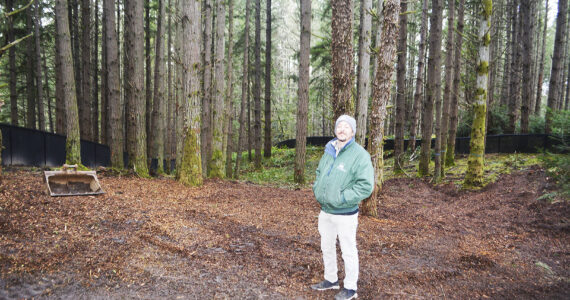 Steve Powell/Kitsap News Group Photos
Travis Wolfe, Horticulture program manager, checks out just a portion of the park for small dogs, which is about 2 acres in size.