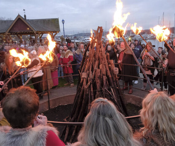 Damon Williams/Kitsap News Group Photos
Vikings from the Sons of Norway get set to light the bonfire on the Poulsbo Waterfront Feb. 10.