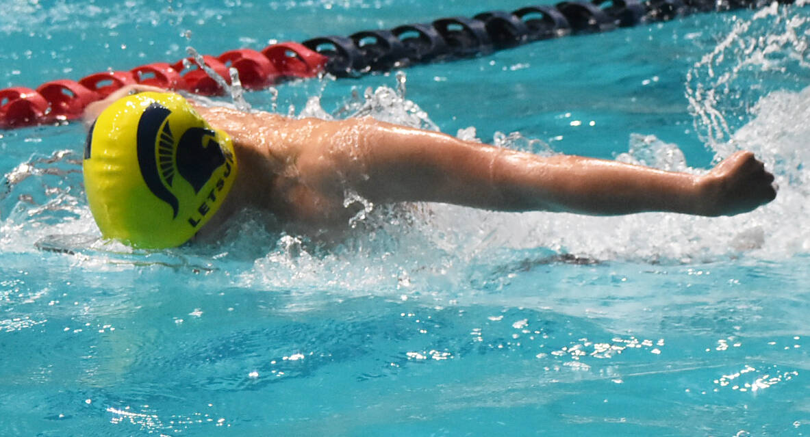 Spartan Ian Letson competes for the 200 medley relay team.