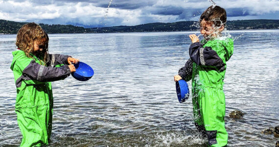 Brandyn Boyd, Magnolia Forest Preschool courtesy photos
Two preschool students play in the water during a school day.