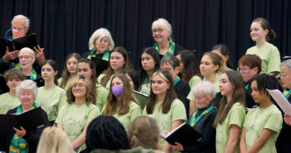 Molly Hetherwick/Kitsap News Group
The Woodward Middle School Choir and the Evergreen Singers team up to sing during the Music for All Generations concert March 27.