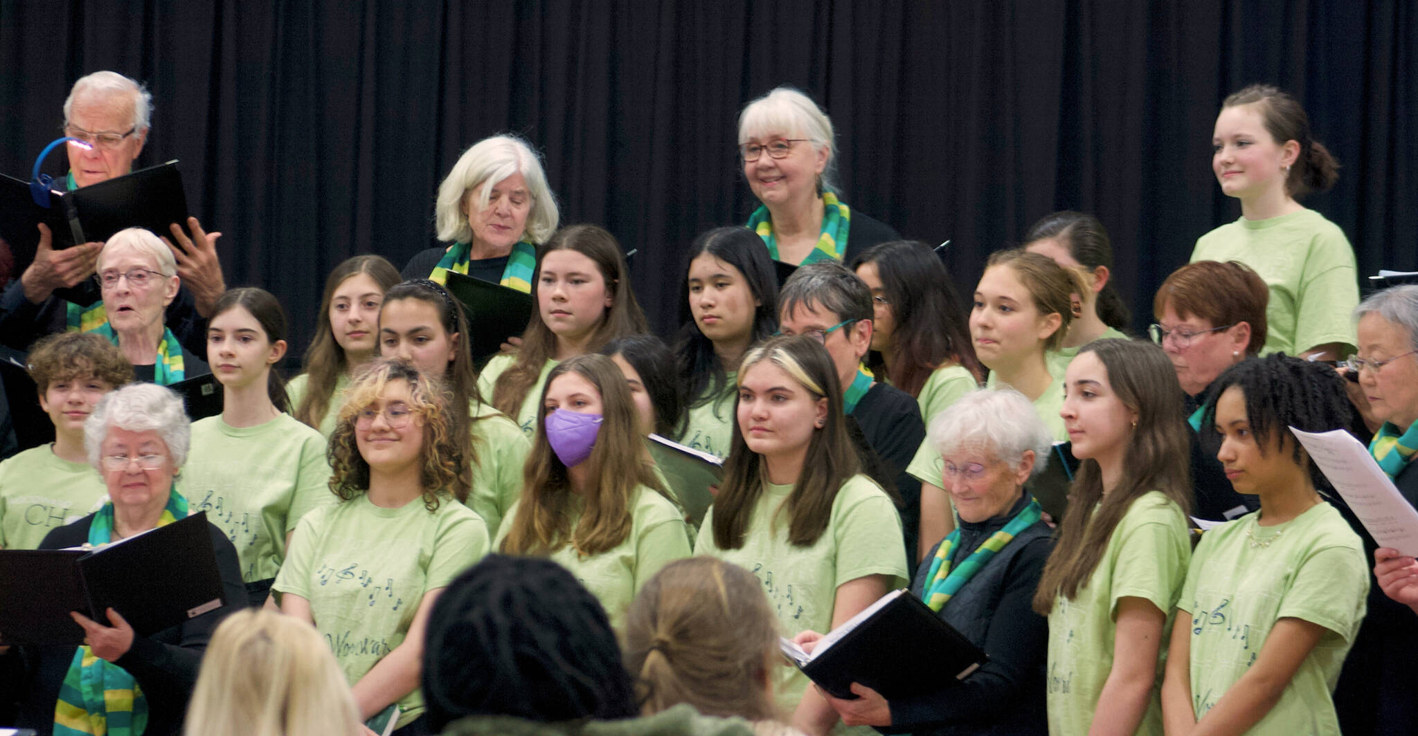 Molly Hetherwick/Kitsap News Group
The Woodward Middle School Choir and the Evergreen Singers team up to sing during the Music for All Generations concert March 27.