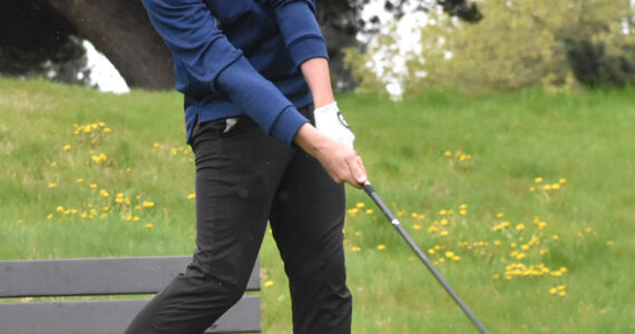 Nicholas Zeller-Singh/Kitsap News Group photos
Spartan Andrew Grinter shoots a 36 against Bremerton.