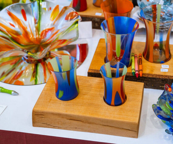 <p>BARN courtesy photo</p>
                                <p>Colorful glass sculptures and table art from Mud Flats Studio, a resident artist group at BARN.</p>