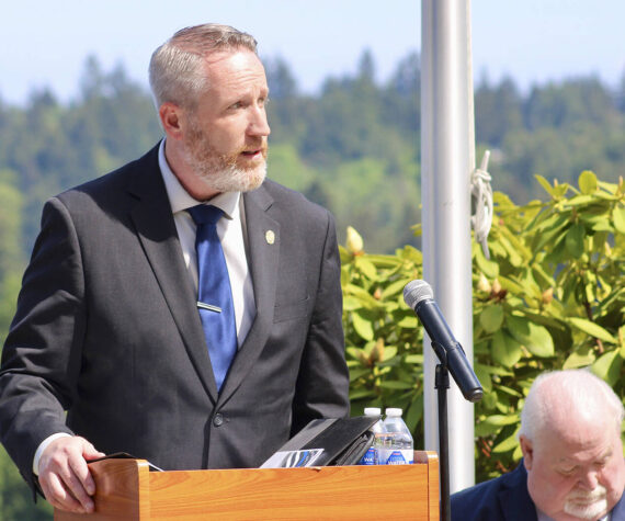 <p>Elisha Meyer/Kitsap News Group photos</p>
                                <p>Port Orchard police chief Matt Brown speaks to a small group of fellow officers and families during the Law Enforcement Memorial Day ceremony.</p>