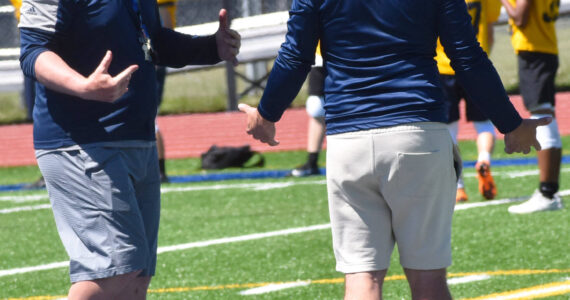 File photo
BHS football coach Dan Schoonmaker (left) has high expectations for his team this season.