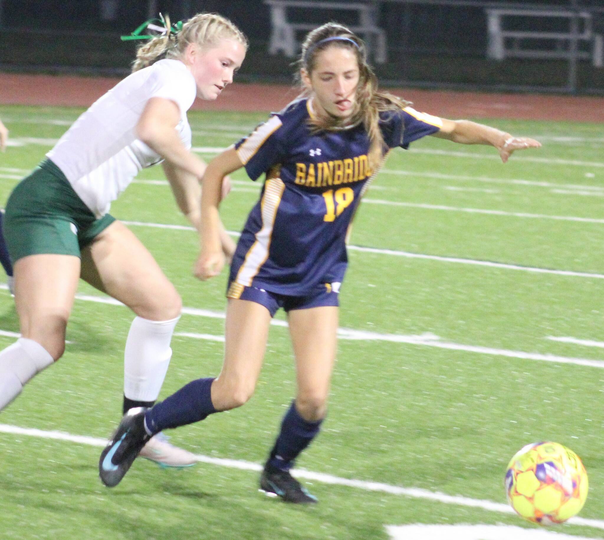 Spartan Vega Hendrickson vies for the ball with a PA defender in a 2-0 home win over the Roughriders Oct. 9.