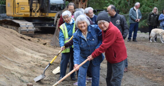 Ellen Sato Faust courtesy photo
Frances Ikegami (left) and her sister, Lilly Kodama (right), both survivors of incarceration during WWII, dig their shovels into the dirt to signify the groundbreaking for the Bainbridge Island Japanese American Exclusion Memorial Visitor Center Oct. 11.